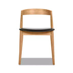 Chaise de salle à manger empilable en chêne sculpté de 20,5 po, revêtement en similicuir brun naturel chaud et noir